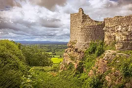 Beeston Castle with views of Cheshire in the background. Beeston Castle is an attraction that can be easily accessed from the Shropshire Union Cana in Cheshire